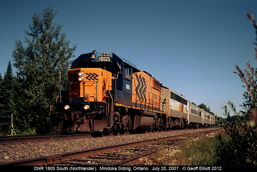 The southbound "Northlander" passes Mindoka siding in July 2007.  We were headed north with our motorcars at the time, as part of a NARCOA organized run, and were put in the siding to wait on 698.  What a great day!!