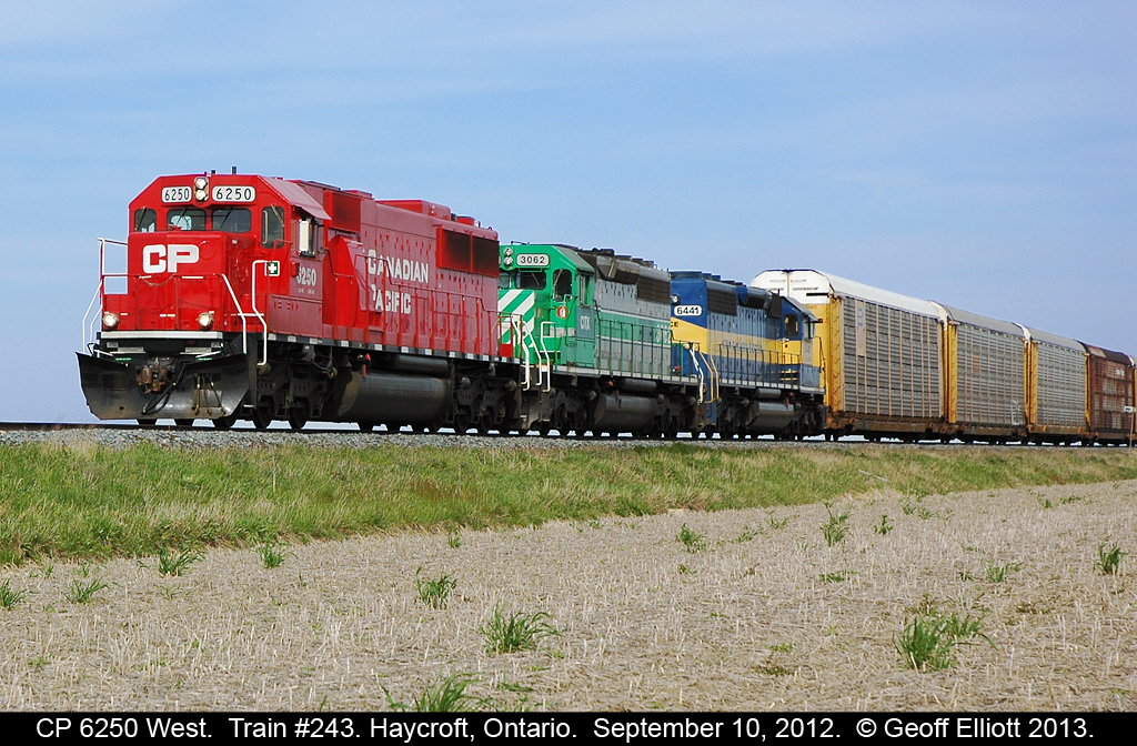 Recently rebuilt CP 6250, ex-SOO 6050, leads a CITX leasor, and an ICE SD40-2 on Train #243 as it passes through the flatlands of Essex County back in September of 2012.