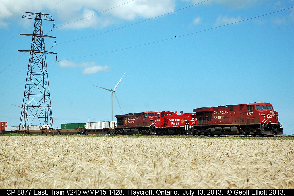 CP train #240, with 8877 in command, includes CP MP15 #1428 in consist today as it is being moved to Montreal.