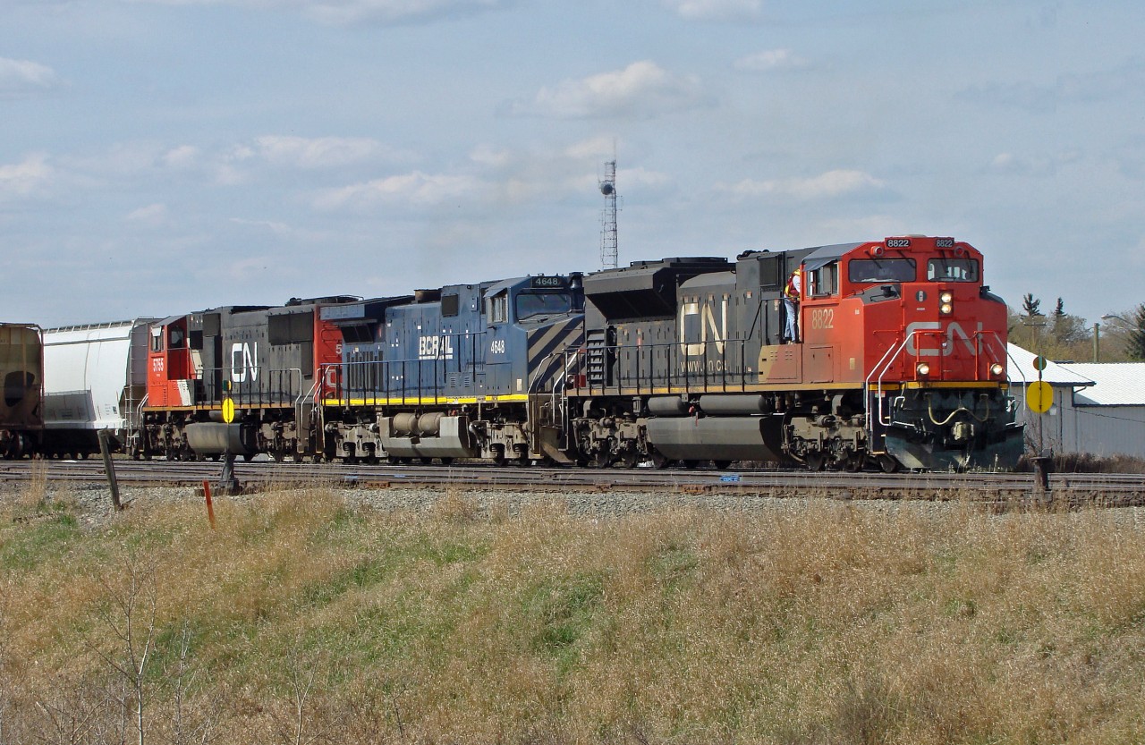 Although no longer a division point Wainwright gives its name to the CN Wainwright Sub and trains still frequently stop here. Still sometimes for a crew change, or just for a meet.  This eastbound is stopped.  The power is SD70M-2 CN 8822, DASH 9-44CW BCOL 4648 and SD75I CN 5755.