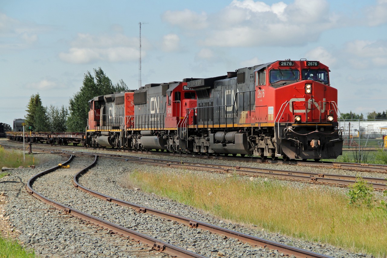 Switching in CN's Camrose Yard.  DASH 9-44CW CN 2676,  SD60 CN 5418 (ex GMTX/GATX) and SD40-2W 5322