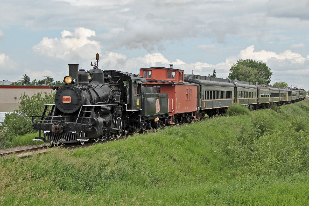 1920 built Baldwin 2-8-0 #41 departs Stettler with the Alberta Prairies Railway Excursions passenger train for the 90 minute journey to Big Valley. (Just 21 miles away!)