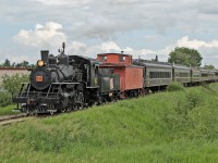 1920 built Baldwin 2-8-0 #41 departs Stettler with the Alberta Prairies Railway Excursions passenger train for the 90 minute journey to Big Valley. (Just 21 miles away!)