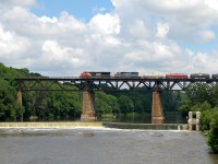 CN 2249 - GTW 5936 soar high above Paris as they cross over the Grand River