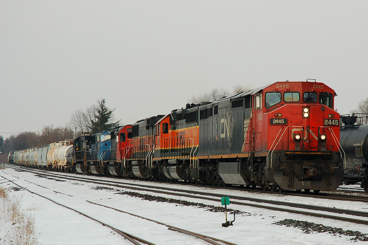 FPON: CN 2445 - BNSF 6820 - BNSF 333 - CN 5366 - NS 6777 - NS 8861 and 141 cars make up CN 394's train as it passes through Brantford on this late February morning. MrDanMoFo will photograph this train later on in Brampton