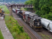 Railfanning in the city of Hamilton, Illinois Central Sunday evening rail...a sight for sore eyes indeed, IC 1001 leads train 330 from Sarnia with traffic for Port Robinson at Stuart Street Yard. In the background one can notice something is obviously missing, yes, the 1929 built Bay Street bridge is in the demolition process to make way for a new non-rotted out bridge.