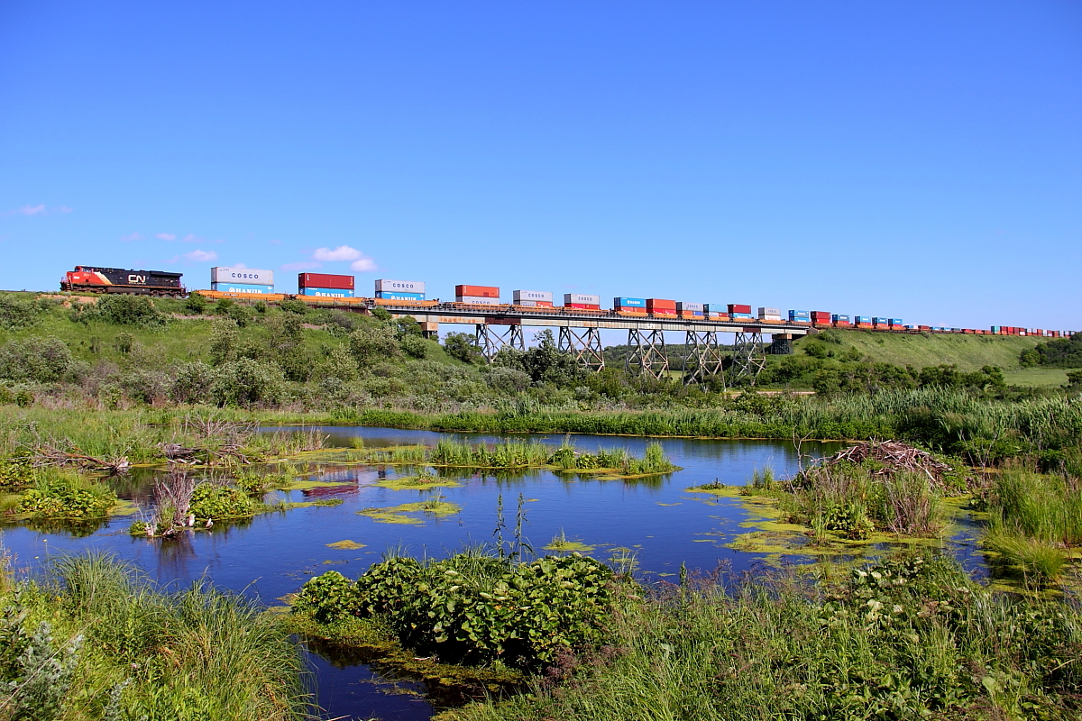CN's Q101 crosses the Little Saskatchewan River valley just east of the town of Rivers.