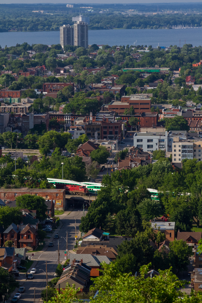 CP 254 catches some evening sunlight as it meanders through downtown Hamilton, crossing over a trestle still stencilled for the TH&B.