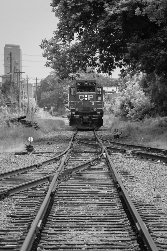 In a scene reminiscent of the past, one can truly get a sense of industrial railroading by following either CP or SOR's belt trackage through North Hamilton. Here, CP's Belt Line job is seen trundling along ex-TH&B trackage at Birmingham St, with Dofasco looming in the distance. With the many power 'upgrades' going on at CP these days, the day will come when it will be impossible to shoot a trio of CP Geeps, get your shots while you can!