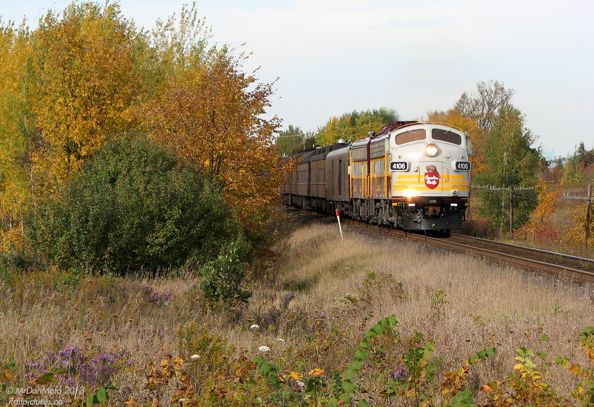 Rolling south through the beautiful fall foliage near Tottenham, a CP business car special comes into view down the line, its pair of F-units in the classic maroon & grey scheme heading 10 vintage heavyweight passenger cars hauling important shippers on a tour of the railway.