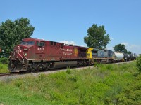 CP 641 heads westbound thru Jeannette mile with some FPON trailing in the consist in the form of CSXT 7349, a Dash 8-40CW