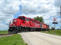 After finishing it's work for the day, CP T29 heads westbound back to Walkerville as it passes thru Tilbury. Leading the way is new GP20C-ECO 2212