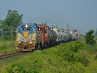 D&H 7304 along with CP 3015 lead T29 eastbound past the east switch at Tilbury as they head for Chatham.