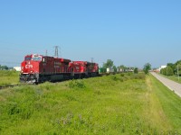 CP 240 heads eastbound thru Tilbury with another MP15 in the consist that is headed for Montreal.