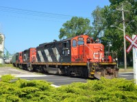 CN 4112 & 7058 shove their cut of hopper cars back into the grain elevator at the end of the Point Edward Spur in Sarnia.