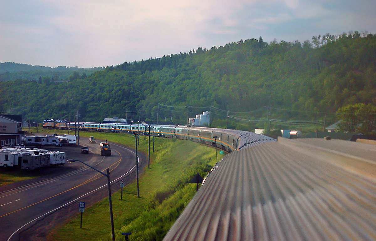 The 'Ocean Limited' rolls through Campbellton, NB, in the early morning light. Taken from the dome of the "Park" car. For more pics & video from my collection see  http://northamericabyrail.info