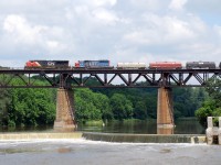 CN 331 crosses the Grand River with GTW 5936 trailing, which is the last GTW-blue SD40-2 in service. 