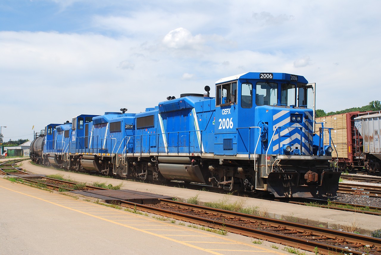 Three CEFX GP20D's roar as SOR 597 struggles to shove clear of signal 228N. Once the conductor walks up and VIA 73 passes, the normally nocturnal train will depart for home rails.