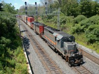 148 passing through Snake with GCFX 6077 - CN 5454, both long gone from CN.
