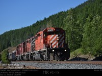 CP train 563 the McConnel Turn with CP6007-5952-5943, a trio of SD40-2's in varying CP paint schemes, are seen in glorious evening light along the banks of the Moyie Lake as they begin their journey to the Teck Trail Smelter.  Usually an evening departure means that only summer light can get this operation in daylight...I think its worth the winter wait to witness this scene, I hope you agree. 