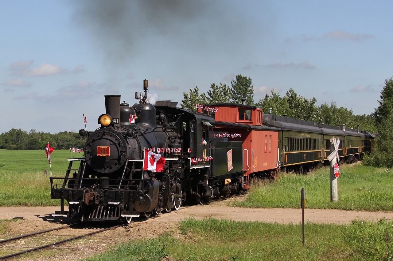 Alberta Prairie Railway's Baldwin 2-8-0 Consolidation #41 leads the Canada Day Excursion to Big Valley south on the Stettler Sub.