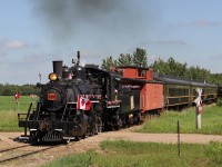 Alberta Prairie Railway's Baldwin 2-8-0 Consolidation #41 leads the Canada Day Excursion to Big Valley south on the Stettler Sub.