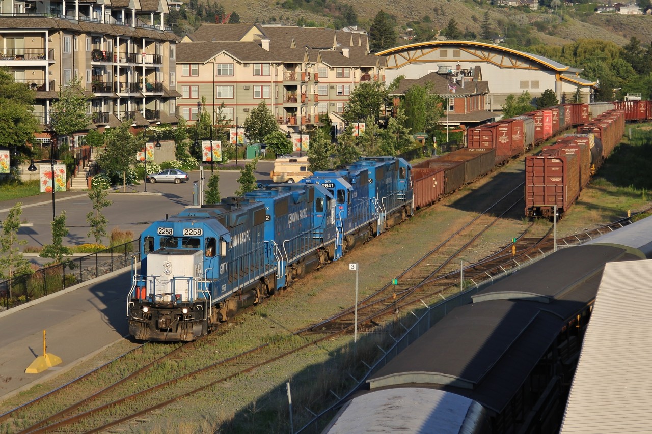 GMTX 2258, GMTX 2632, GMTX 2641 and LLPX 2606 lead the KPR train to Vernon passed the former CN station in Kamloops as they reach Mile 3 on CN's Okanagan Connecting Track.