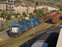 GMTX 2258, GMTX 2632, GMTX 2641 and LLPX 2606 lead the KPR train to Vernon passed the former CN station in Kamloops as they reach Mile 3 on CN's Okanagan Connecting Track.