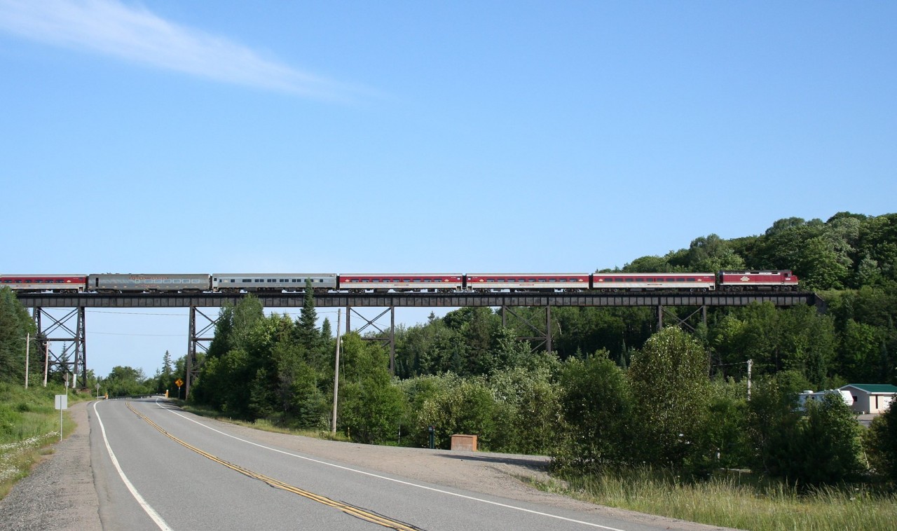 CN F40PH 105 leads an 8-car 633, the northbound Algoma Central Railway Agawa Canyon Tour Train crosses the Bellevue Trestle enroute to Agawa Canyon Park. CN 104 is bringing up the rear of the train in a push-pull configuration so that no runaround move needs to be made at Canyon.