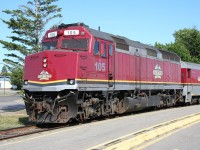 CN F40PH 105 basks in the late afternoon sun after returning to Sault Ste Marie with the Agawa Canyon Tour Train. (Operating with engines at each end in a push-pull configuration, 105 would have actually brought up the rear of the southbound train.)

If you take a look at the windshield of the locomotive, note the forward facing camera just inside the cab. Video from the camera in the lead unit is relayed to monitor screens inside the upgraded passenger coaches used on the tour train.