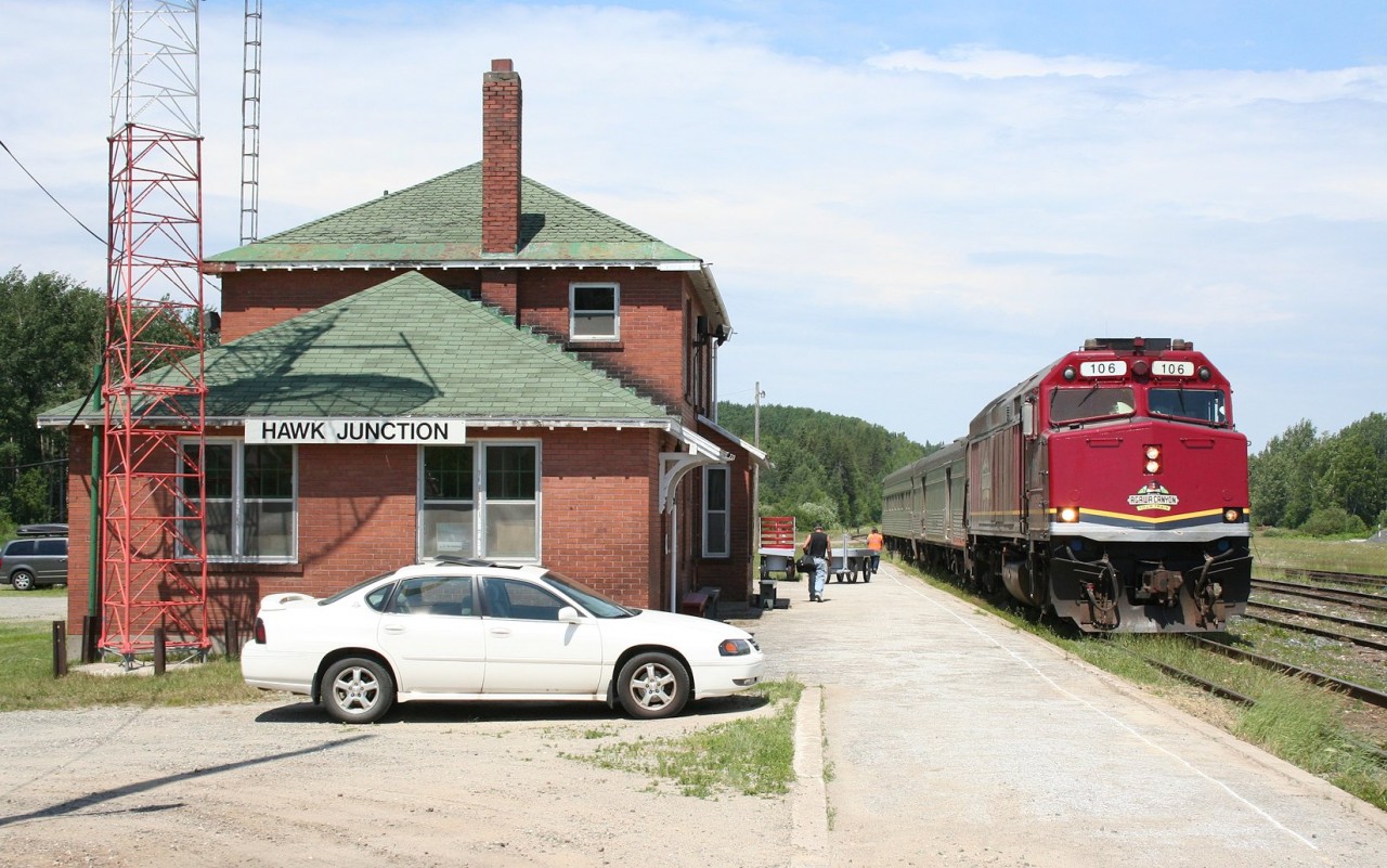 The Agawa Canyon Tour Train logo on the nose notwithstanding, CN F40PH 106 leads train 632, the regular thrice-weekly Hearst-Sault Ste. Marie passenger train at Hawk Junction. This train and the aforementioned tour train are the last vestiges of the Algoma Central name, and is one of the last local passenger trains in the country not operated by VIA Rail.