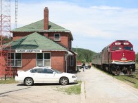 The Agawa Canyon Tour Train logo on the nose notwithstanding, CN F40PH 106 leads train 632, the regular thrice-weekly Hearst-Sault Ste. Marie passenger train at Hawk Junction. This train and the aforementioned tour train are the last vestiges of the Algoma Central name, and is one of the last local passenger trains in the country not operated by VIA Rail.