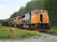 Ontario Northland SD75i 2103 along with SD40-2 1735 and SD75i 2104 crawl through a slow order at Kirkland Lake, Ontario with a rather sizeable train 211 consisting of mostly copper concentrates and empty acid tankcars bound for the smelter at Rouyn-Noranda, Quebec.
<br><br>The trailing unit, ONT 2104, was lifted off of the same day's <a href="http://www.railpictures.ca/?attachment_id=10543">train no. 308</a> at the siding at Jardin. 308's left behind southbound traffic would be lifted later that evening by when this train returns from Noranda as no. 512 for Englehart.