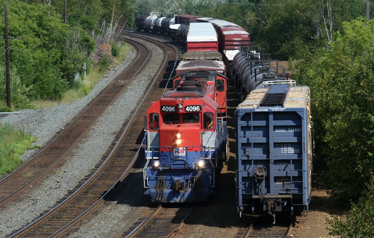 The daily Ottawa Valley Railway freight train from North Bay arrives at Canadian Pacific's Sudbury yard with RLK 4096 and RMPX 9426 leading. After setting off their inbound train, the crew will lift a pair of CP SD40-2s (5922 and 5932) from the shop area before lifting their outbound traffic and returning to North Bay as train no. 430.