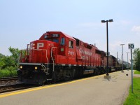 GP38-2 Leads The Streetsville turn heading Eastbound. Made it to the platform and saw headlights Just about a mile up the tracks so was in a rush, thats my  camera bag on the ground over there.