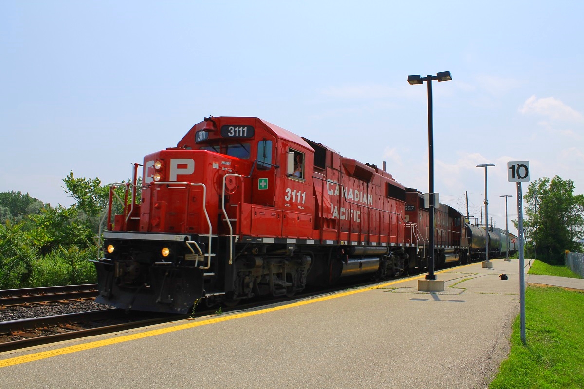 GP38-2 Leads The Streetsville turn heading Eastbound. Made it to the platform and saw headlights Just about a mile up the tracks so was in a rush, thats my  camera bag on the ground over there.