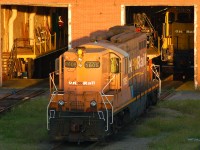 ONT GP9 #1605 basking in the late evening sun, as ONT 2201 sits just inside the shop