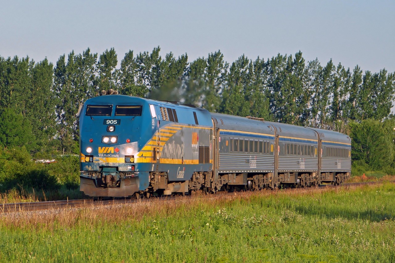 VIA 905 travels east on the Alexandria Subdivision with Montreal bound train #30.