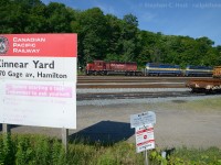 At Kinnear Yard, we see the power for train 640-060 waiting for a crew, and TG11's power on an adjacent track.