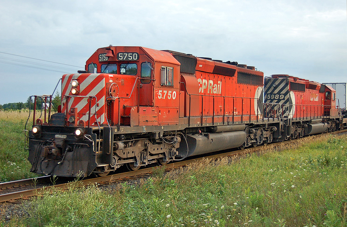 In the days when it still ran during the daylight hours, CP Rail SD40-2 #5750 leads an eastbound Expressway at Quinte West, ON. For more pics & video from my collection see  http://northamericabyrail.info