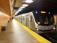 Back when the "Toronto Rocket" subway trains were brand-new and entering service, the photographer was getting off his usual train at Union when one of the few TR's in service pulled in going the opposite direction. Presented with the opportunity, he decided to catch his first ride on set 5426 northbound.
<br><br>
Due to constant door problems that delayed us as well as create a service gap in front, it quickly became crammed riding up the Univeristy line. Trains were literally backed up from behind, and everyone was getting on our train.
<br><br>
My original intent was to have a quick ride to see what the fuss was about, and simply get off at St. Andrew for a shot, but St. Andrew is somewhat boring. It was decided Queen's Park or St. Patrick would be nice, but since the crowds were packing on and made it somewhat impossible to move (much less get out) until St. George, I decided to go a little further and get my shot at the more unique Dupont Station.
<br><br>
(All this for one shot put me behind time for my GO train and caused a whole bunch of ramifications, one of which was enduring a slow GO bus ride home up the Don Valley Parkway, equivalent to watching paint try while having your teeth pulled by a monkey).
