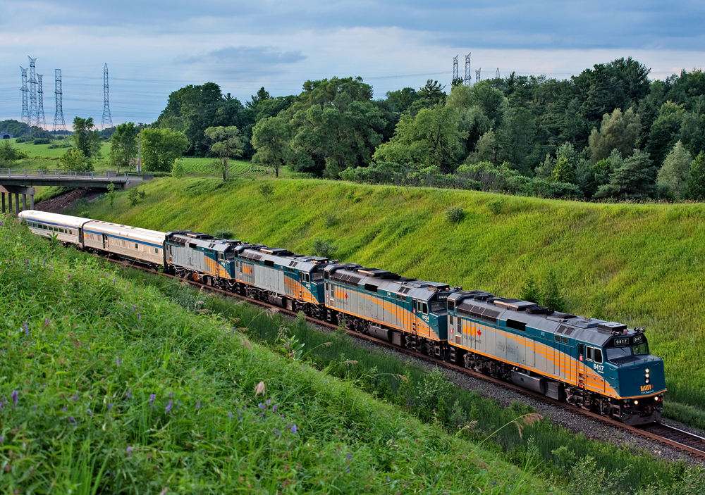 Very rare do you see passenger trains on a freight only subdivision but on this occasion VIA 602, a hospital train of equipment heads east on CN's York Subdivision at Beare. The last two trailing units and cars were involved in a washout in Togo, SK and are seen heading to Montreal.
