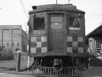 An end view of Grand River Railway car 848 at Hespeler Station. The original Hespeler Station building is believed to have been built just after the service began by the then Galt, Preston & Hespeler Street Railway Company in January 1896. In later years, an express car was left in place in the early afternoon for loading. Passenger service ended in 1955, and the building lasted into the late 1960s after electrical service had ended, before being demolished. <br><br> Photo taken by Cecil Hommerding, from the collection (Copyright) of Doug Leffler. Substantial caption information provided by George Roth et al with much thanks. <br><br> <i><u>More views of GRR's passenger operations:</u></i><br> 848 and 842 MU'ed for the return trip: <a href=http://www.railpictures.ca/?attachment_id=10746><b>http://www.railpictures.ca/?attachment_id=10746</b></a><br> 848 at Preston: <a href=http://www.railpictures.ca/?attachment_id=10298><b>http://www.railpictures.ca/?attachment_id=10298</b></a><br> 864 at Galt Station: <a href=http://www.railpictures.ca/?attachment_id=10474><b>http://www.railpictures.ca/?attachment_id=10474</b></a> <br><br> For more details on Cecil, see <a href=http://www.railpictures.ca/?attachment_id=10297><b>here</b></a>.