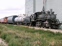 1920 built Baldwin 2-8-0 is seen at Donalda as #9. This is the same loco that now operates the Alberta Prairies Steam Excursion out of Stettler as #41.  Tom Payne's  Central Western Railway was just 3 years old at the time of this shot.  Sadly the Donalda tracks are no longer in place but Mr. Payne's railway went on to become RaiLink and paved the way for short line operations in Canada as we know them today.