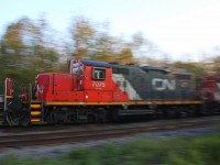 A CN freight carrys 2 GP9RM's behind a pair of SD70M-2's through Glovers Road in Newtonville 