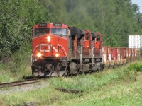 CN 406 heading to Saint John, NB with this big freight.  Traffic on this line has increased since the Lac-Megantic tragedy.