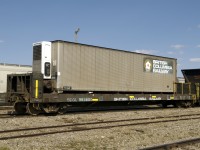 Here is a shot of "the grocery car", It was used to transfer food and supplies from Fort St John to Gutah camp at mile 864 of the Fort Nelson Sub. Unfortunately all but the flatcar portion was destroyed by a fire in late 2012. CN now uses a small steel container hoisted on to the back of a 10-ton hi-rail truck for deliveries to Gutah.  