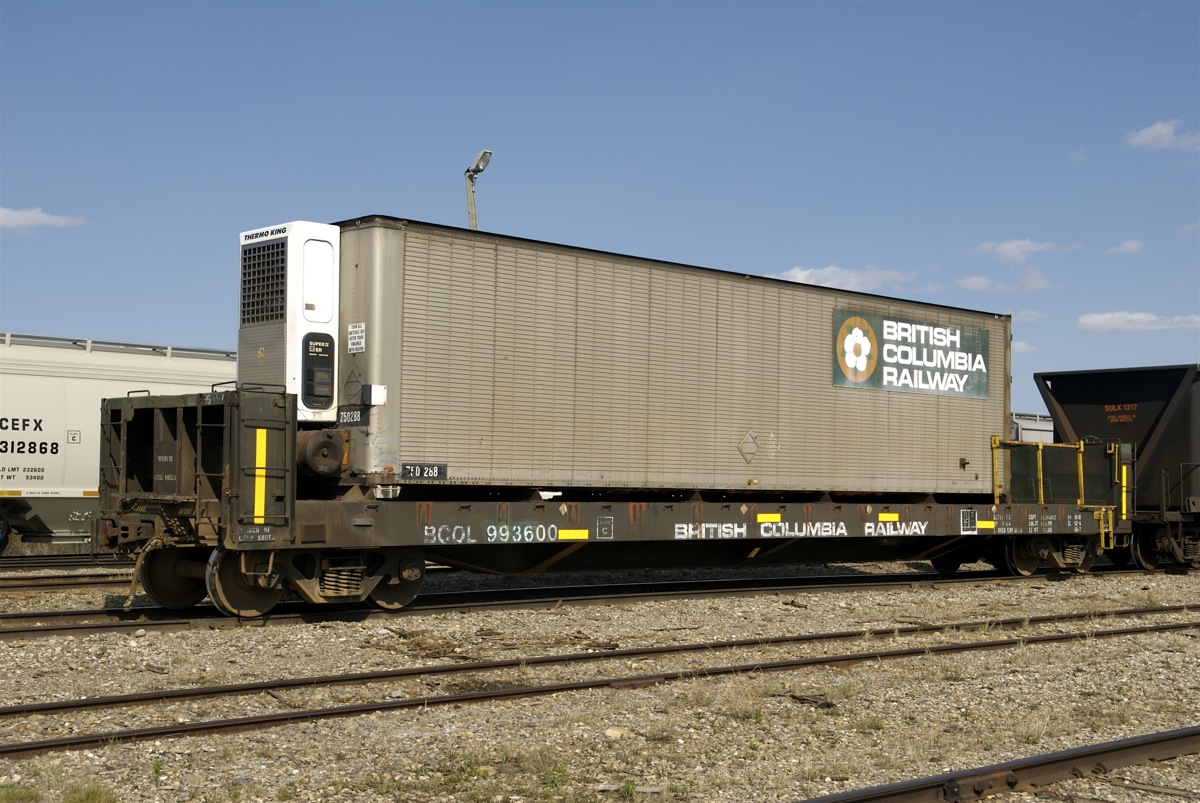 Here is a shot of "the grocery car", It was used to transfer food and supplies from Fort St John to Gutah camp at mile 864 of the Fort Nelson Sub. Unfortunately all but the flatcar portion was destroyed by a fire in late 2012. CN now uses a small steel container hoisted on to the back of a 10-ton hi-rail truck for deliveries to Gutah.