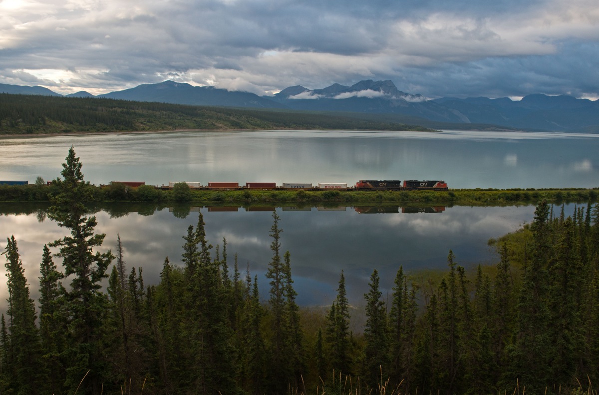 CN 8003 and 2322 lead train 199 west into the rockies.