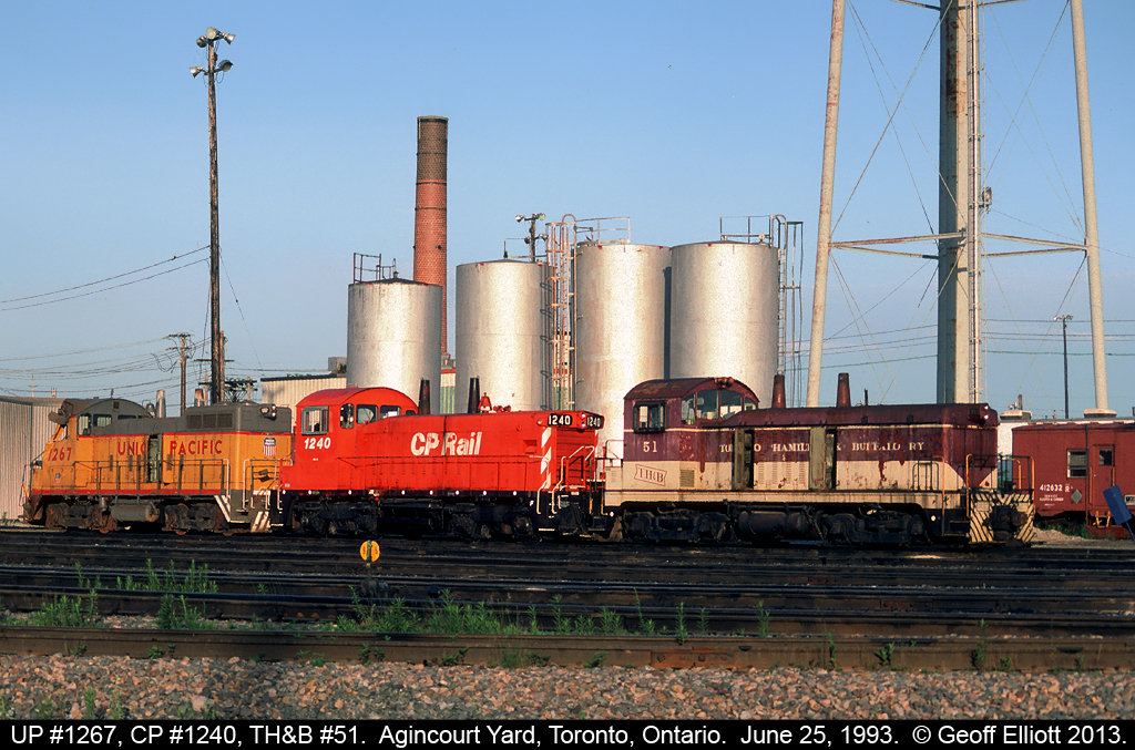 For those that like switchers, here's a variety for you.  TH&B NW2 #51, now part of Ontario Southland's roster, CP SW1200RSu #1240, and Union Pacific SW10 #1267 share some quality time together in Agincourt Yard in Toronto back in June of 1993.  UP 1267 was apparently supposed to have been setoff in Chicago off of a 500 train, but crews failed to do so and it ended up making it all the way to Toronto before someone caught the mistake.  Bad for the crews, but good for Railfans.